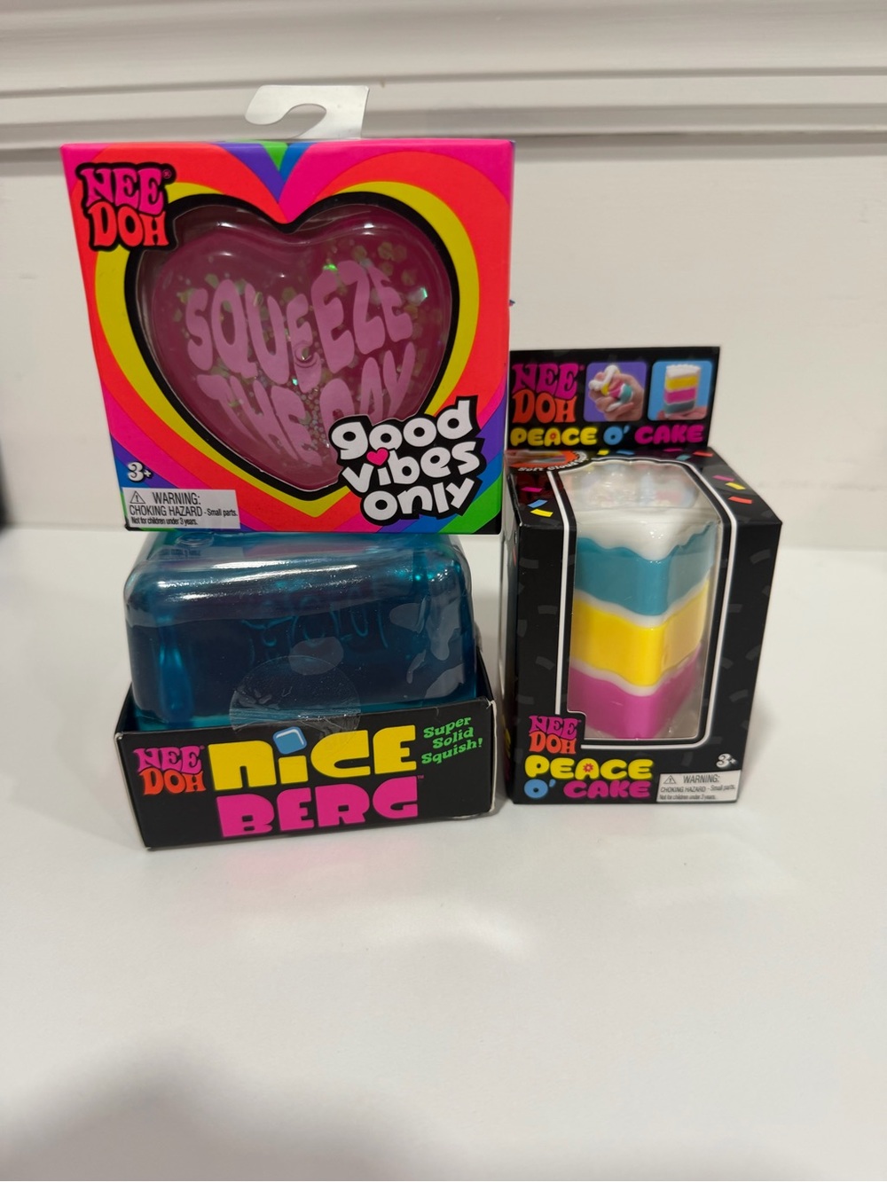 NeeDoh Bundle-Good Vibes Only Pink Heart, JUMBO Blue Iceberg, Peace O’ Cake!